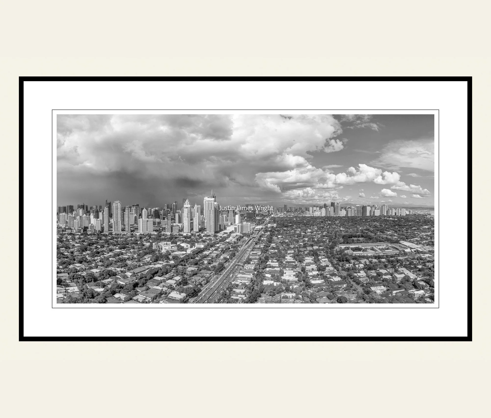A black and white archival photography print of the skyline of the City of Makati