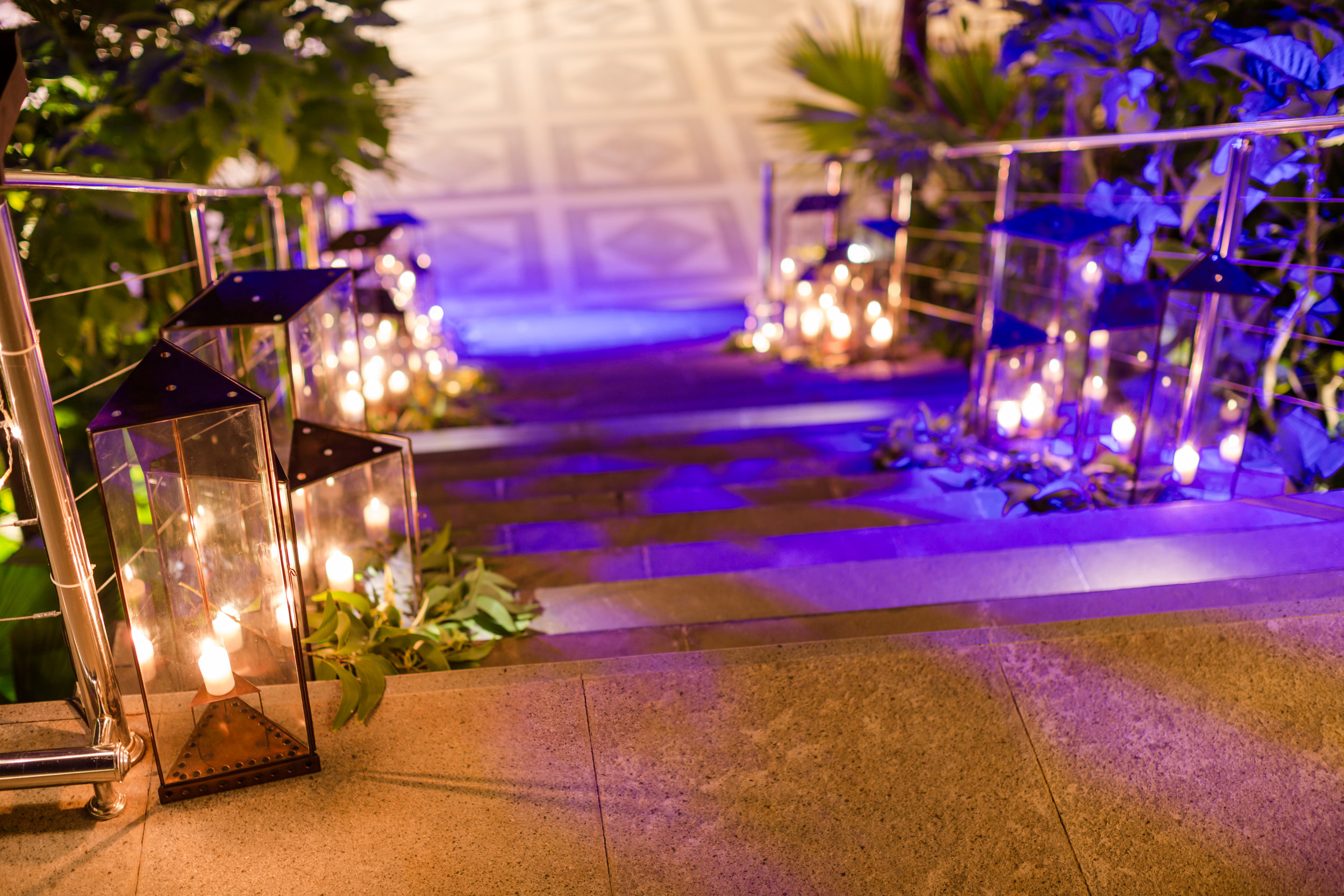 Tropical Destination Wedding Staircase glowing with Candles Lights.jpg