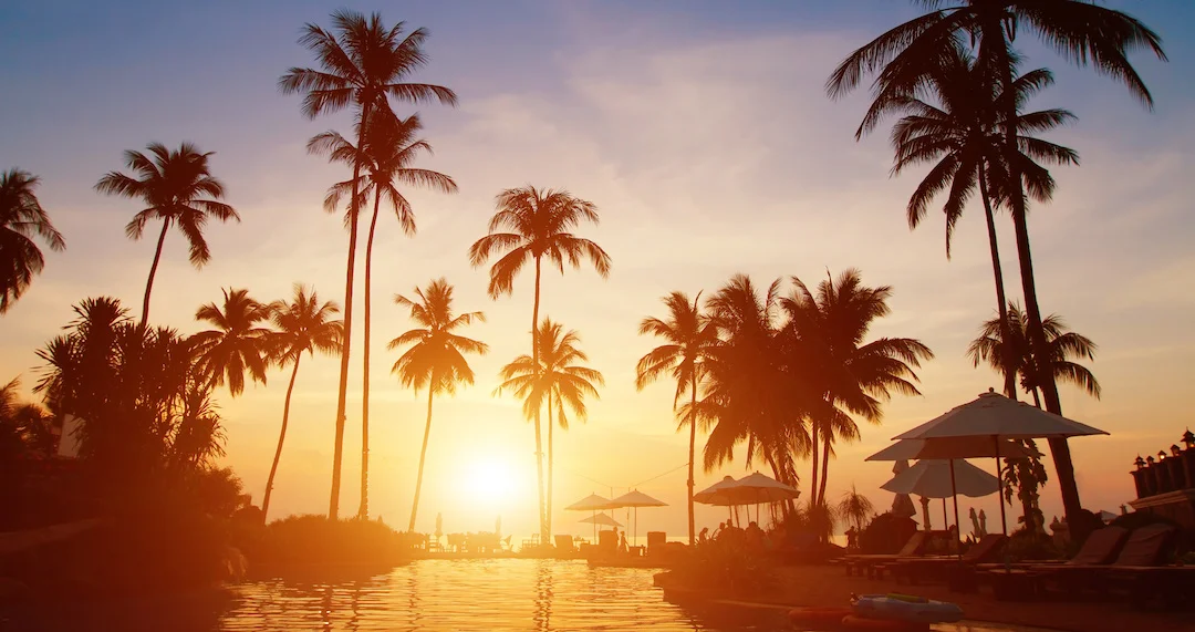summer holidays, paradise tropical beach background, luxurious hotel at sunset