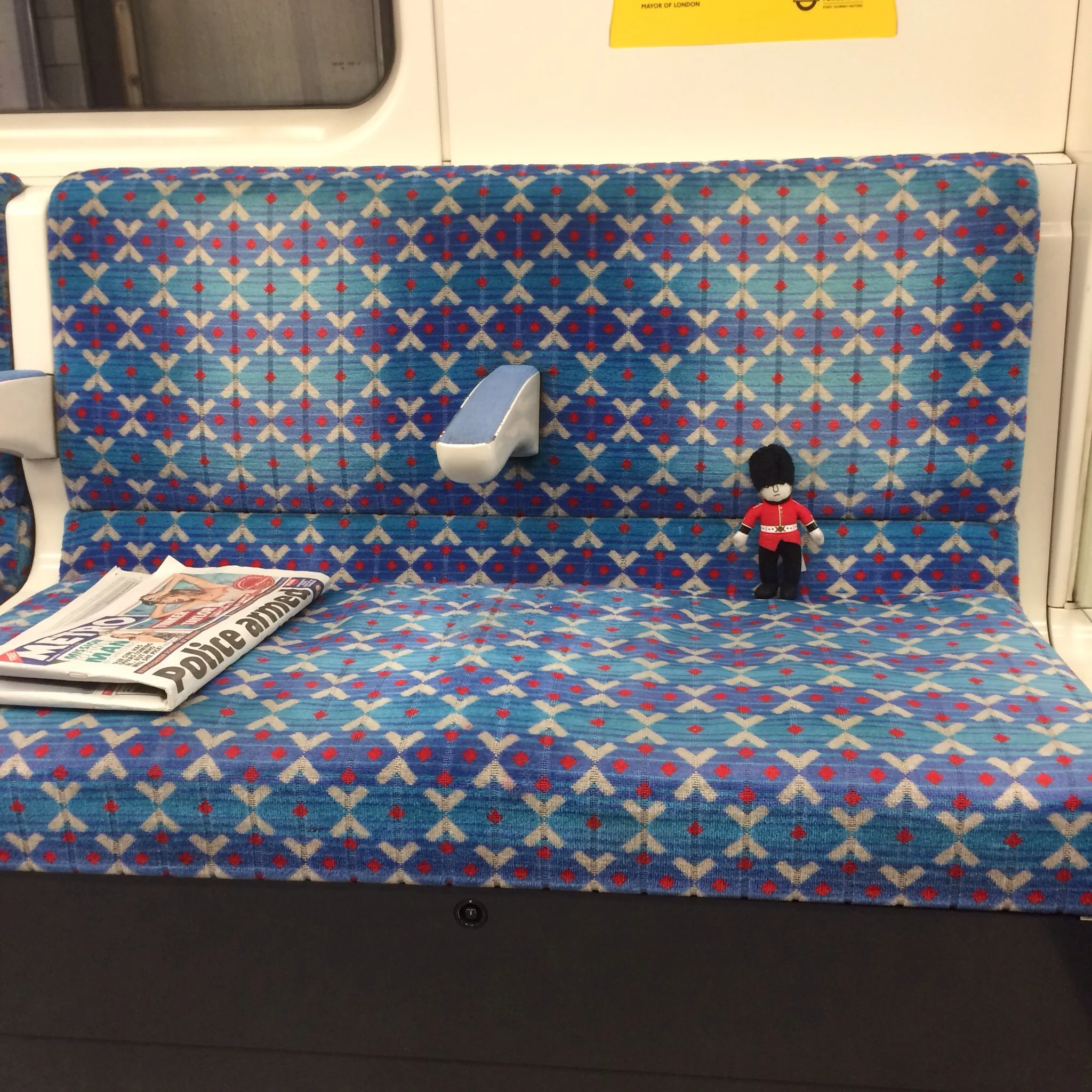 My little event buddie got his own seat on the tube to Brixton Station.