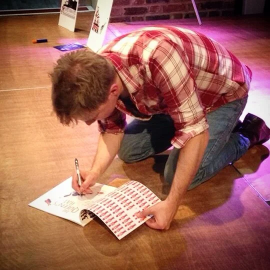 Signing on the floor, as you do.
