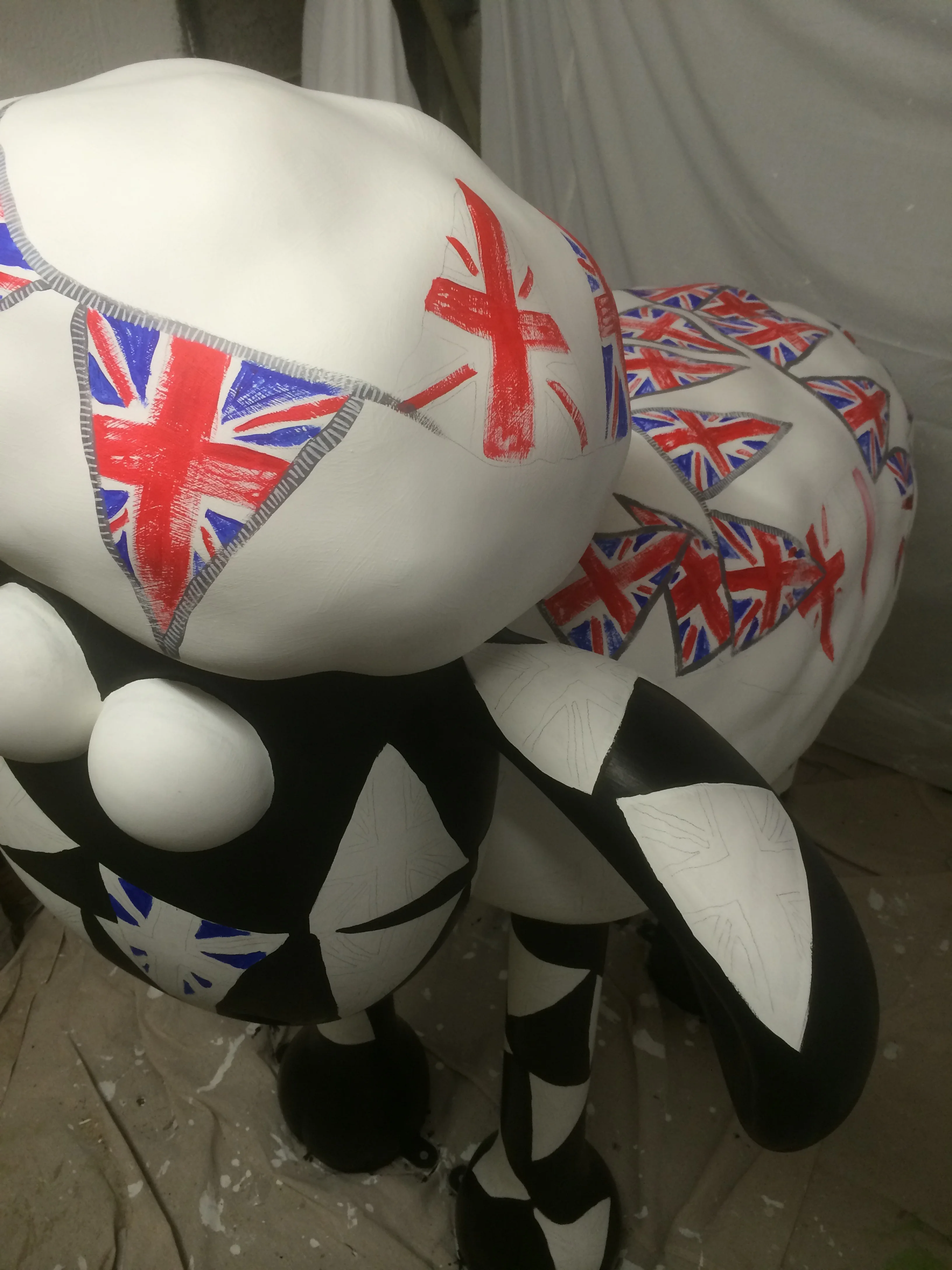 The flags took ages. I painted the red and blue first and then I added the grey string.