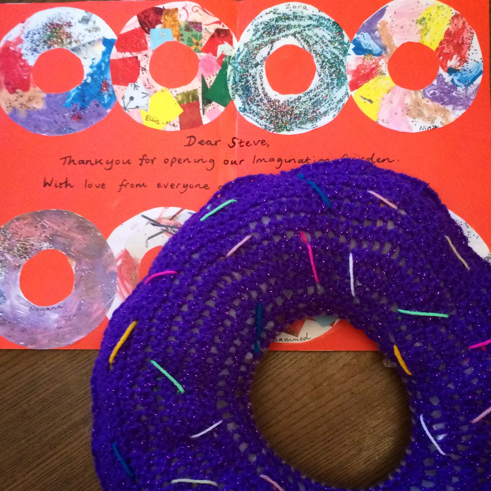 A colourful doughnut card and a giant doughnut: a thank you gift from the school!