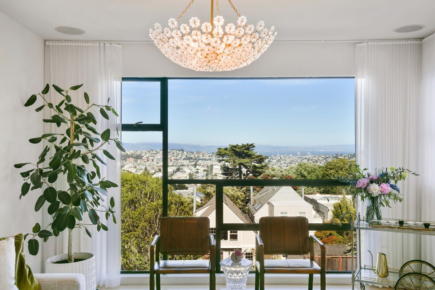 A room with a view! San Francisco Bay at her finest looking eastward. Light and bright modern home swathed in soft white paint and French oak flooring dressed with antiques and collected items through the years. A perfect blend of feminine and mascul