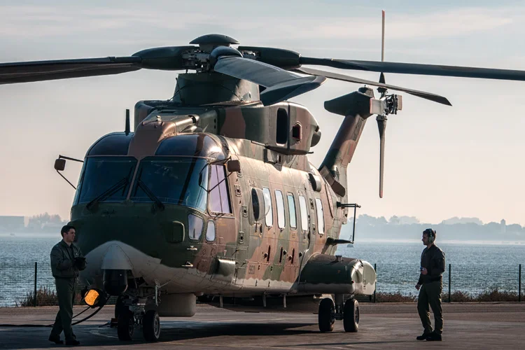 Checking over the on duty EH-101 Merlin that would be used for a SAR mission.
