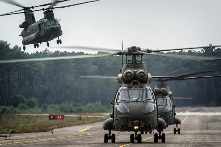 Two 230 Squadron RAF Puma HC2s and a RNLAF CH-47D Chinook recovering back at Ovar. 