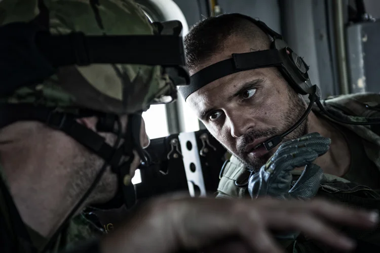 Deep in conversation after boarding the 751 Squadron EH101 Merlin. 