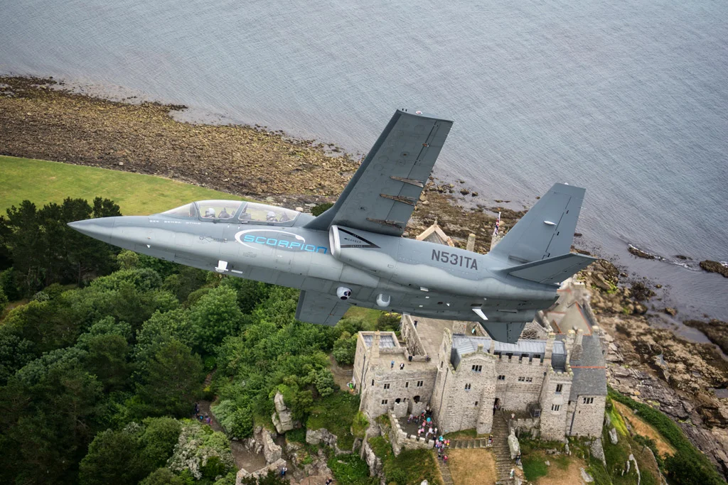 Flying over St Michaels mount in Cornwall as tourists look up at our formation.