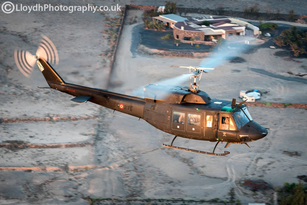 BHELMA VI AB212 flying over Lanzarote at sunset. 
