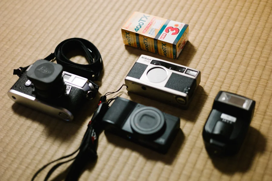 Leica M4 w/28mm Elmarit ASPH, Nikon 35Ti, Ricoh GR, Metz 20 C-2, and of course Tri-x
