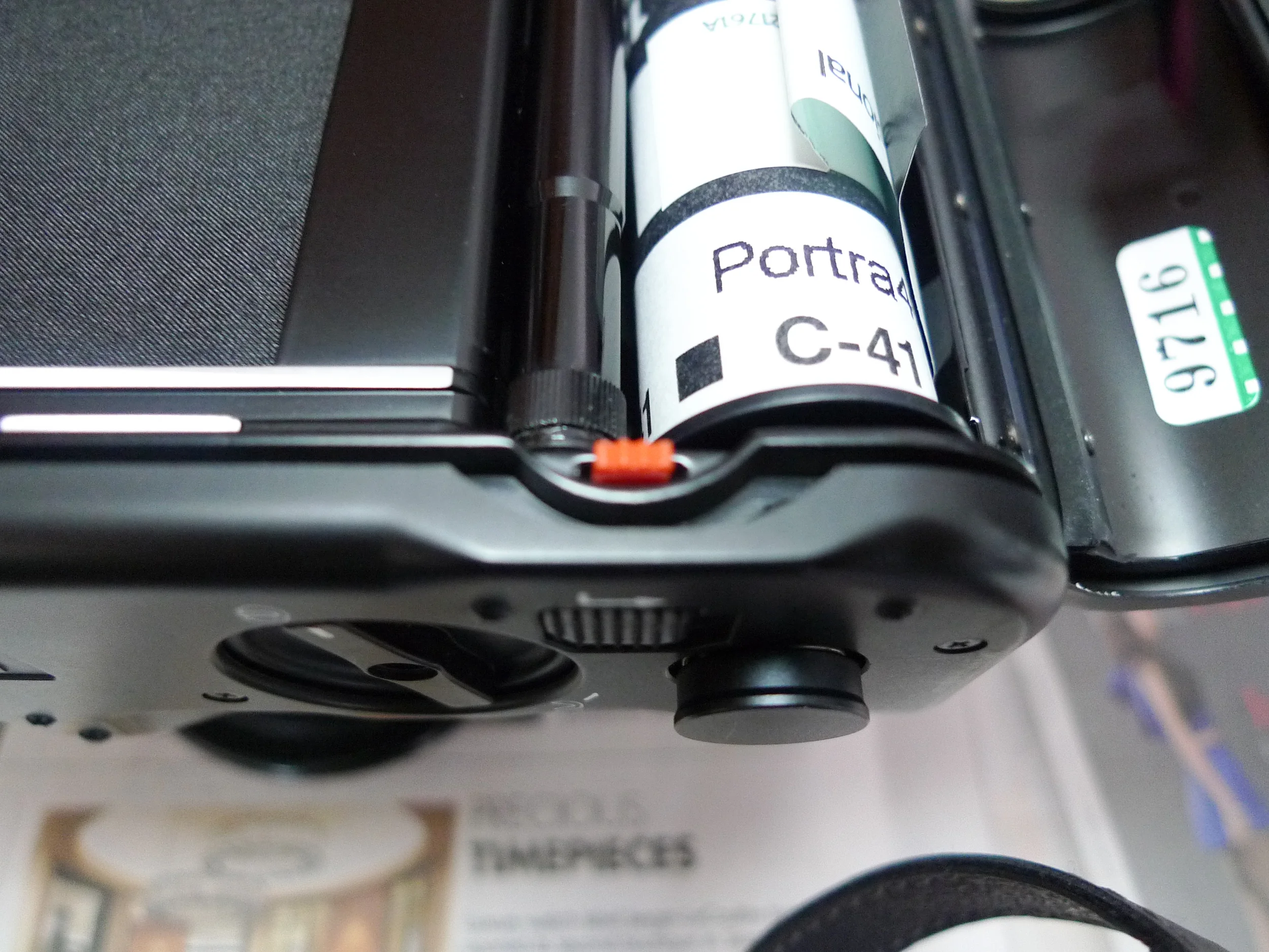 Now that the spool is released, the spool knob will pop out. Insert a new spool and push the knob in to lock the spool 