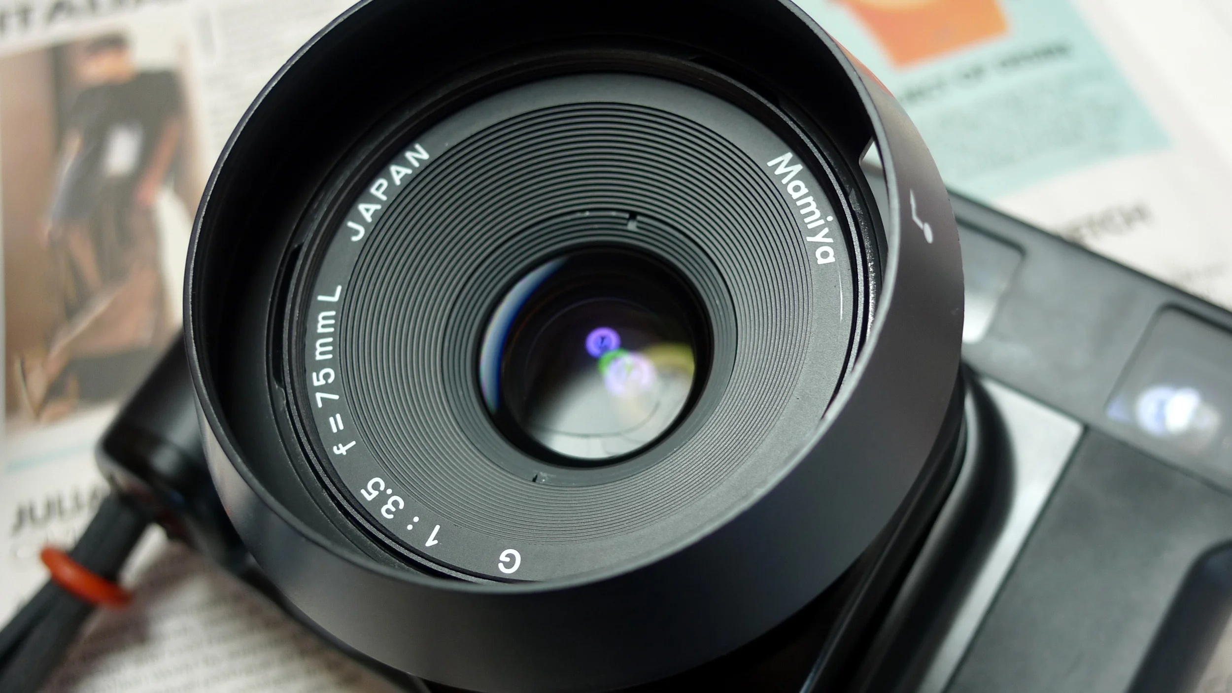 Multi-coated lens