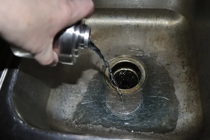 This is the pre-wash water being poured away. Note the blue color.