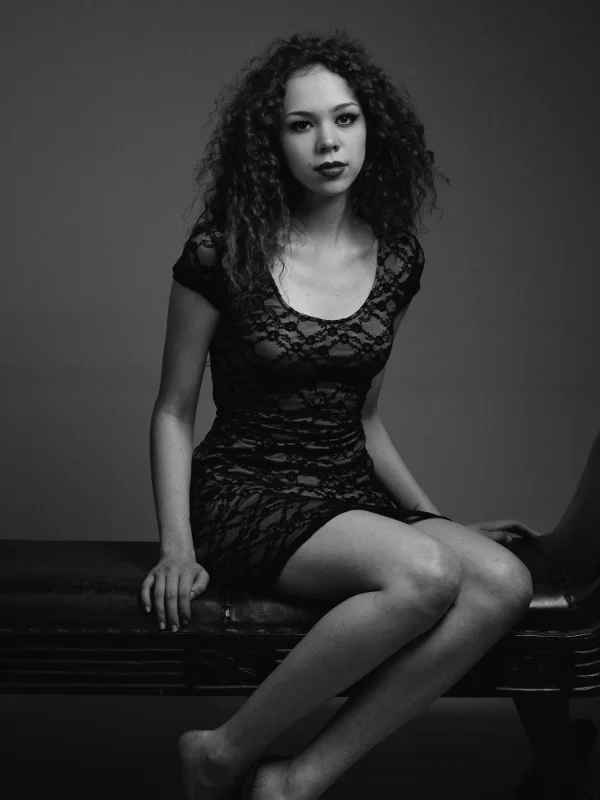 1 light setup. Softbox placed to camera right. White foamcore board used as reflector to camera left. Ilford Pan F Plus.