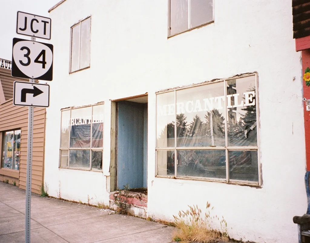 I was standing on the sidewalk not far from the sign. 