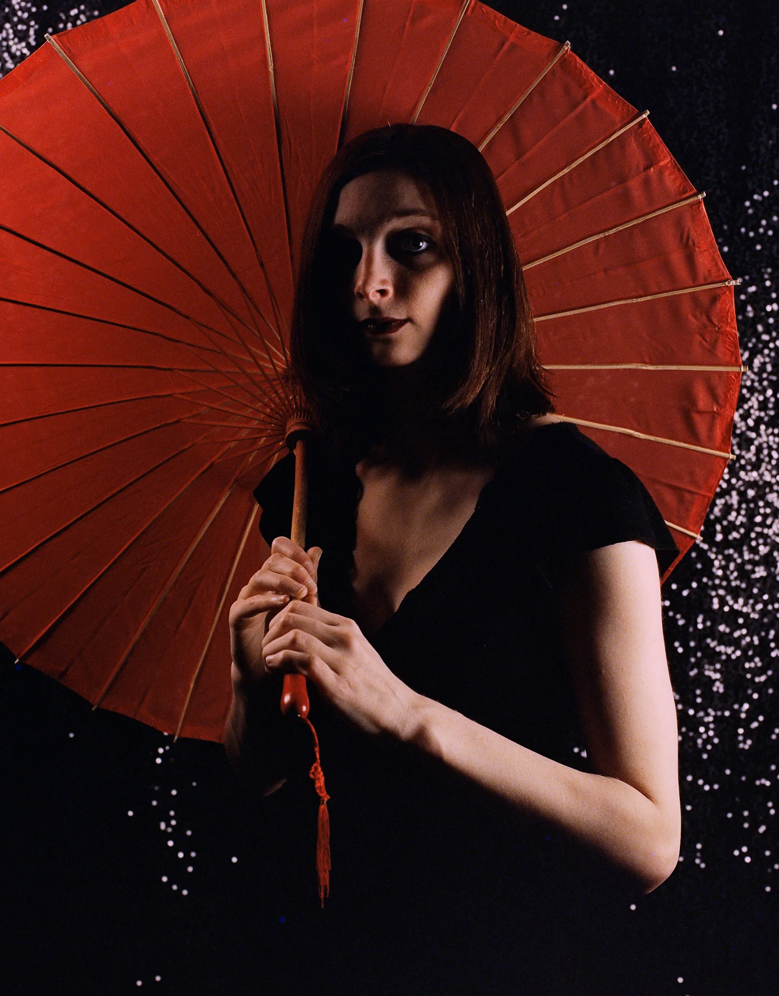 CineStill 800T 120 (shot at 640 ISO), Mamiya 645 Pro TL, 80mm f/1.9. Lighting - one 20"x20" soft box.