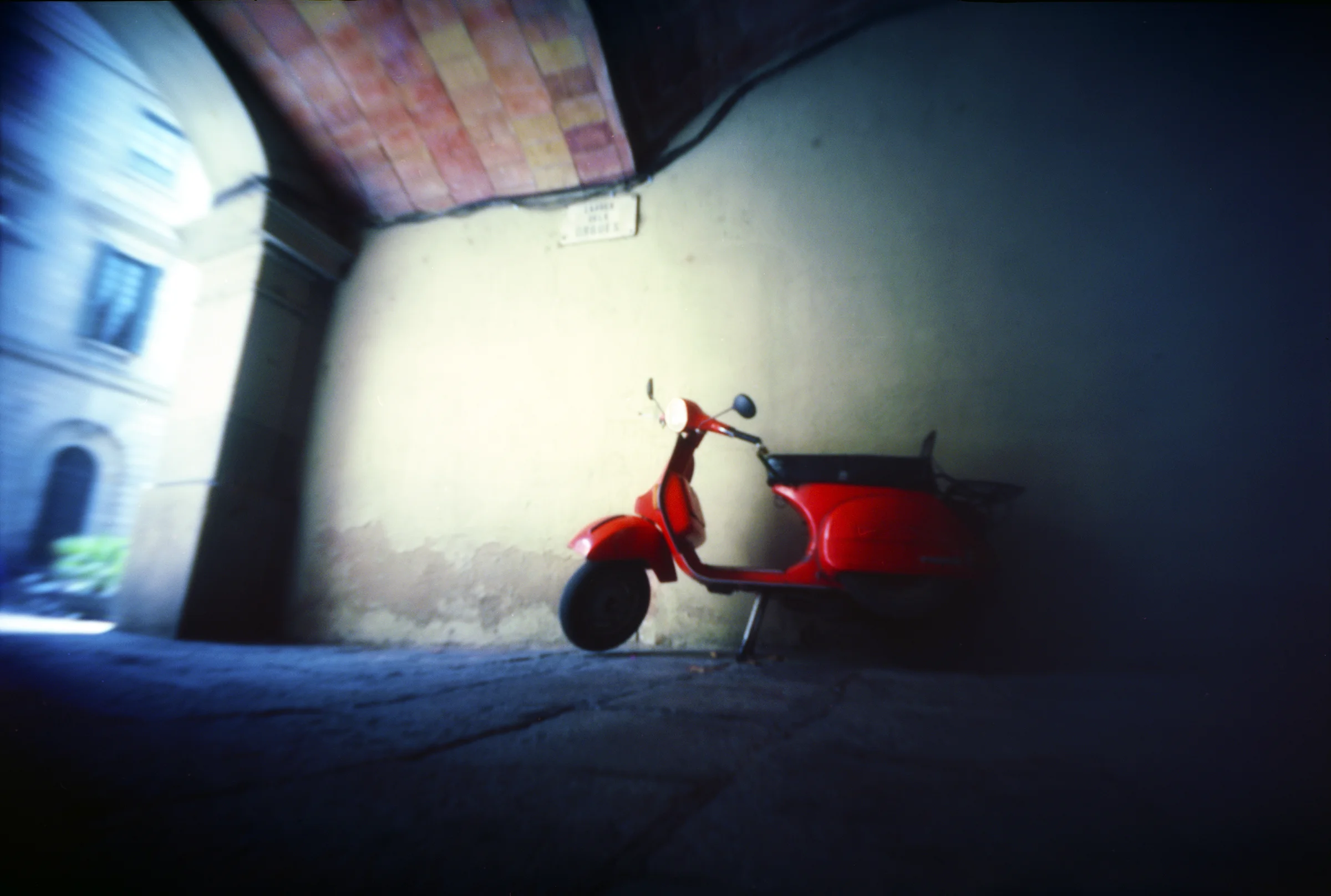 Red scooter - Barcelona, Spain - Aug 24th 2013 - Kodak Ektar 100 in a hacked MIOM Photax Blindé curved plane pinhole camera