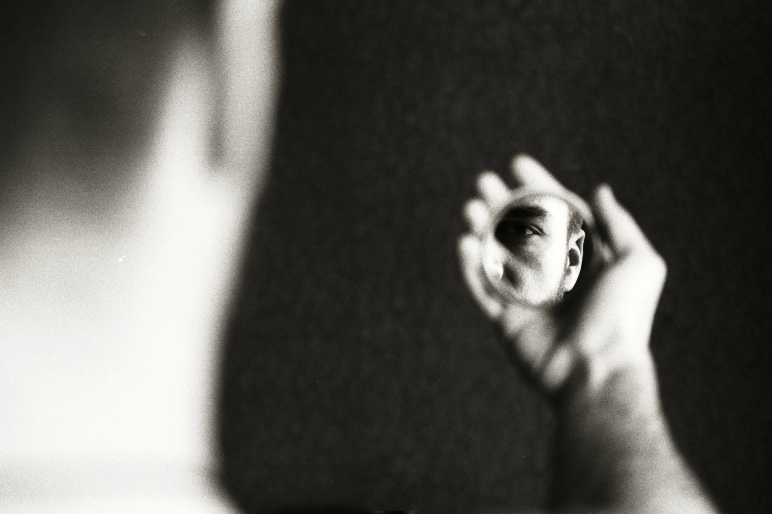 Zurab Chachanidze | Face in little mirror | Nikon F90 | Kodak T-Max 100
