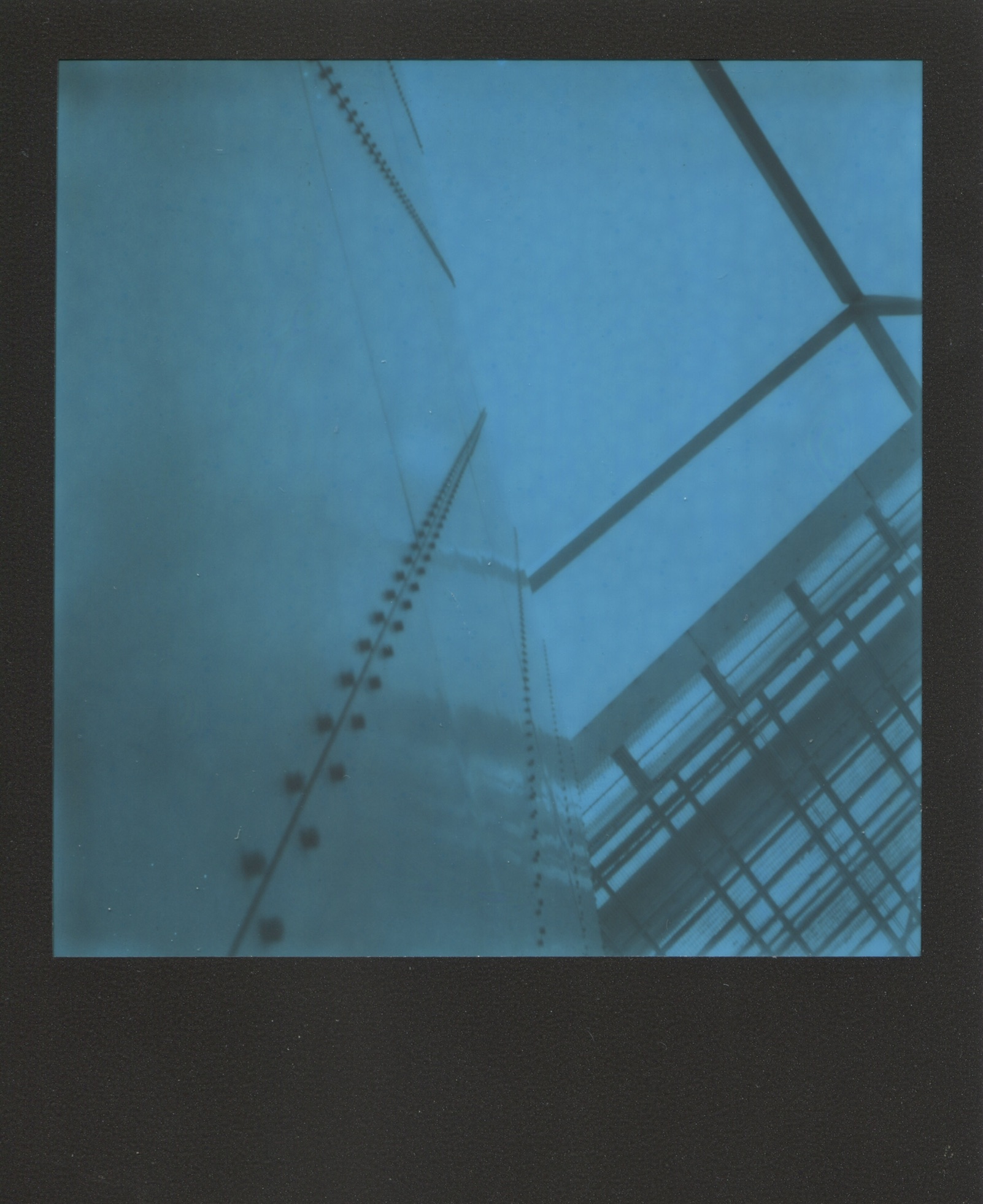 Docking Station | Converted SX70 | Black Blue Polaroid | Lucinda Nicholas