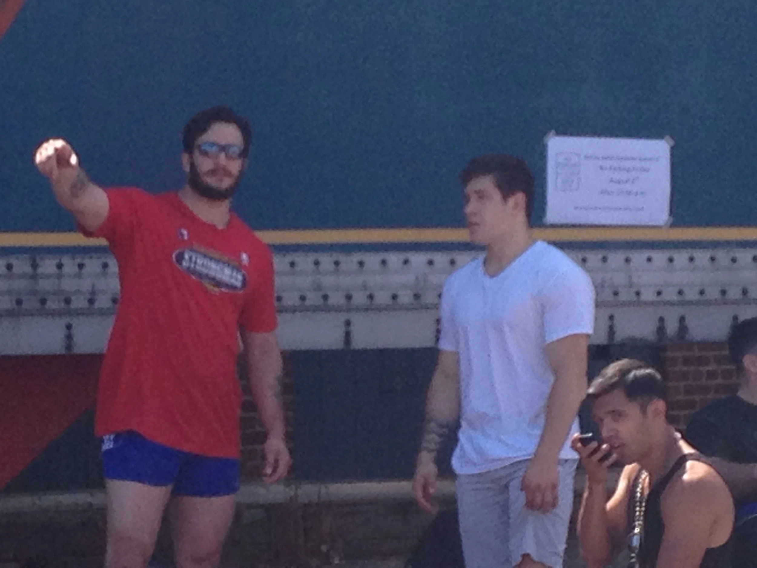 Steve tells the new guys where they can go to get muscles. 