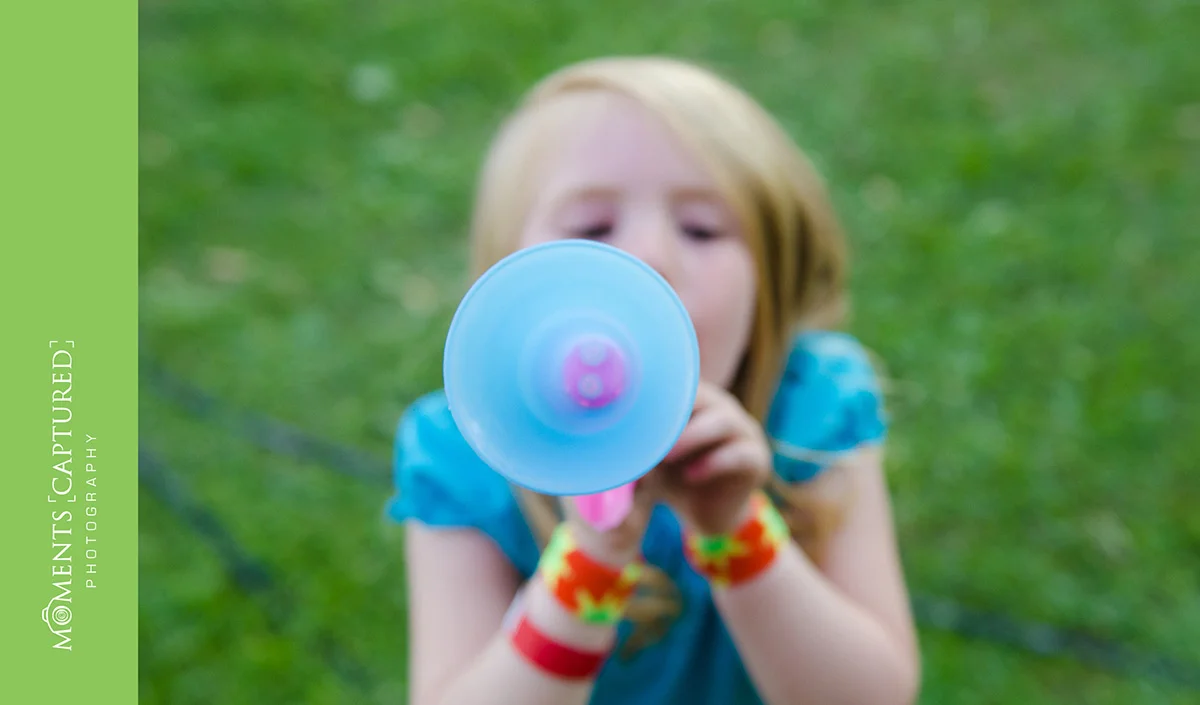 Girl playing with toy.jpg