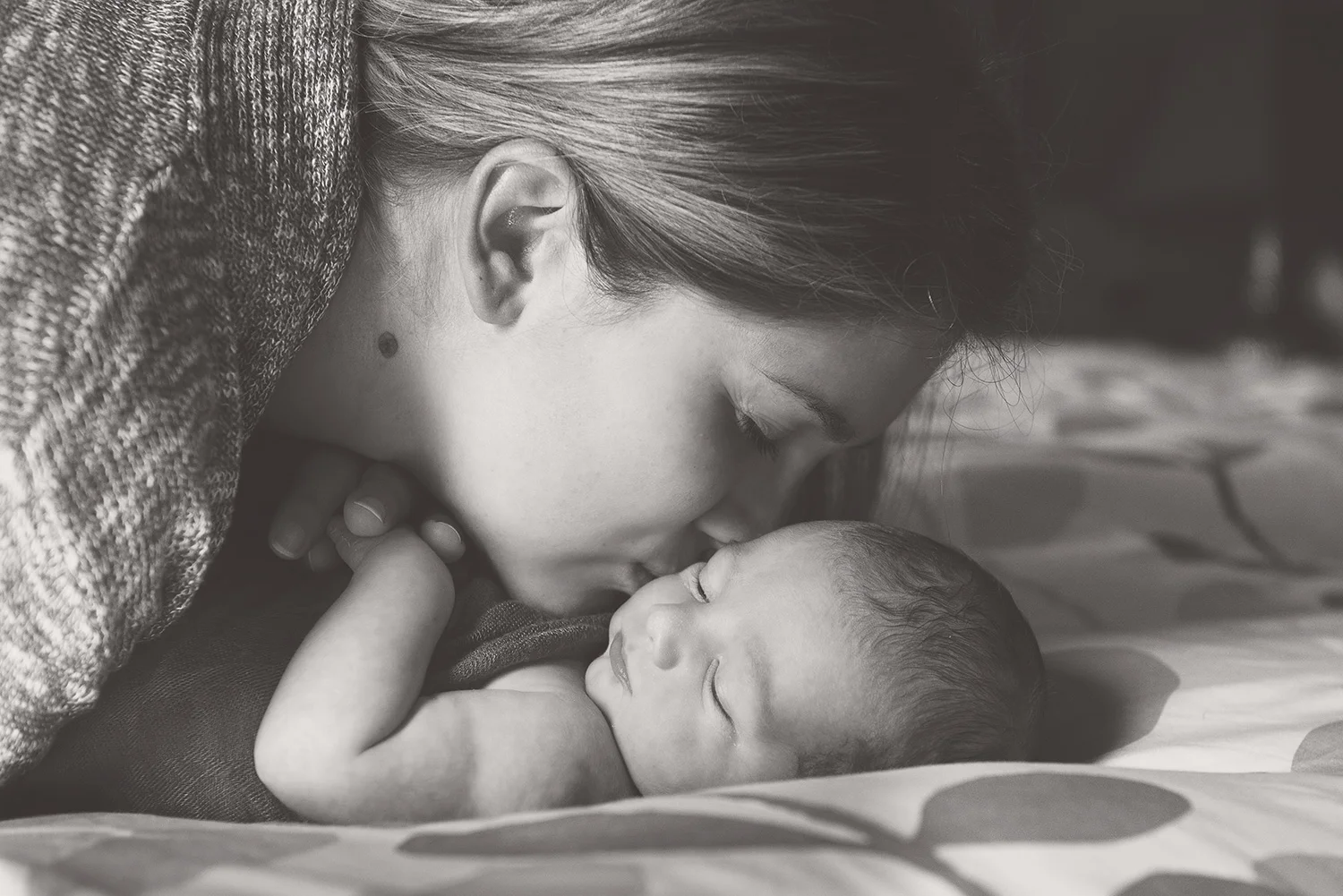 Mother-Newborn-Photo-Bed-Kiss.jpg