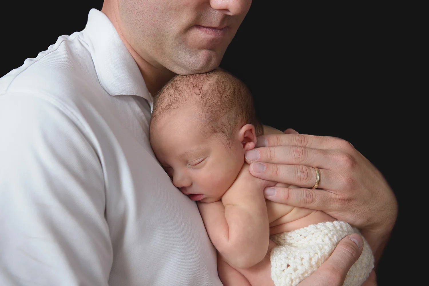 Father-Son-Hug-Black-Background.jpg