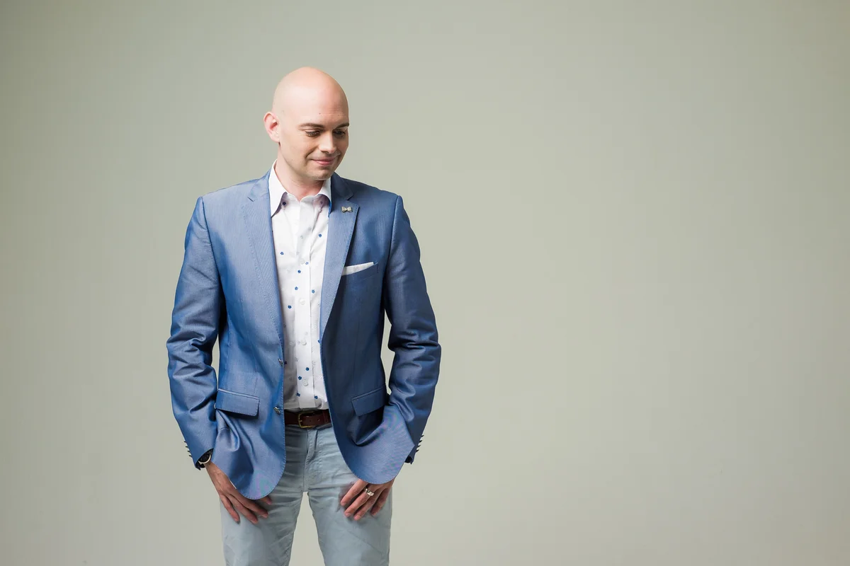 Julian's looks, whether formal or more casual, are classic and tailored.