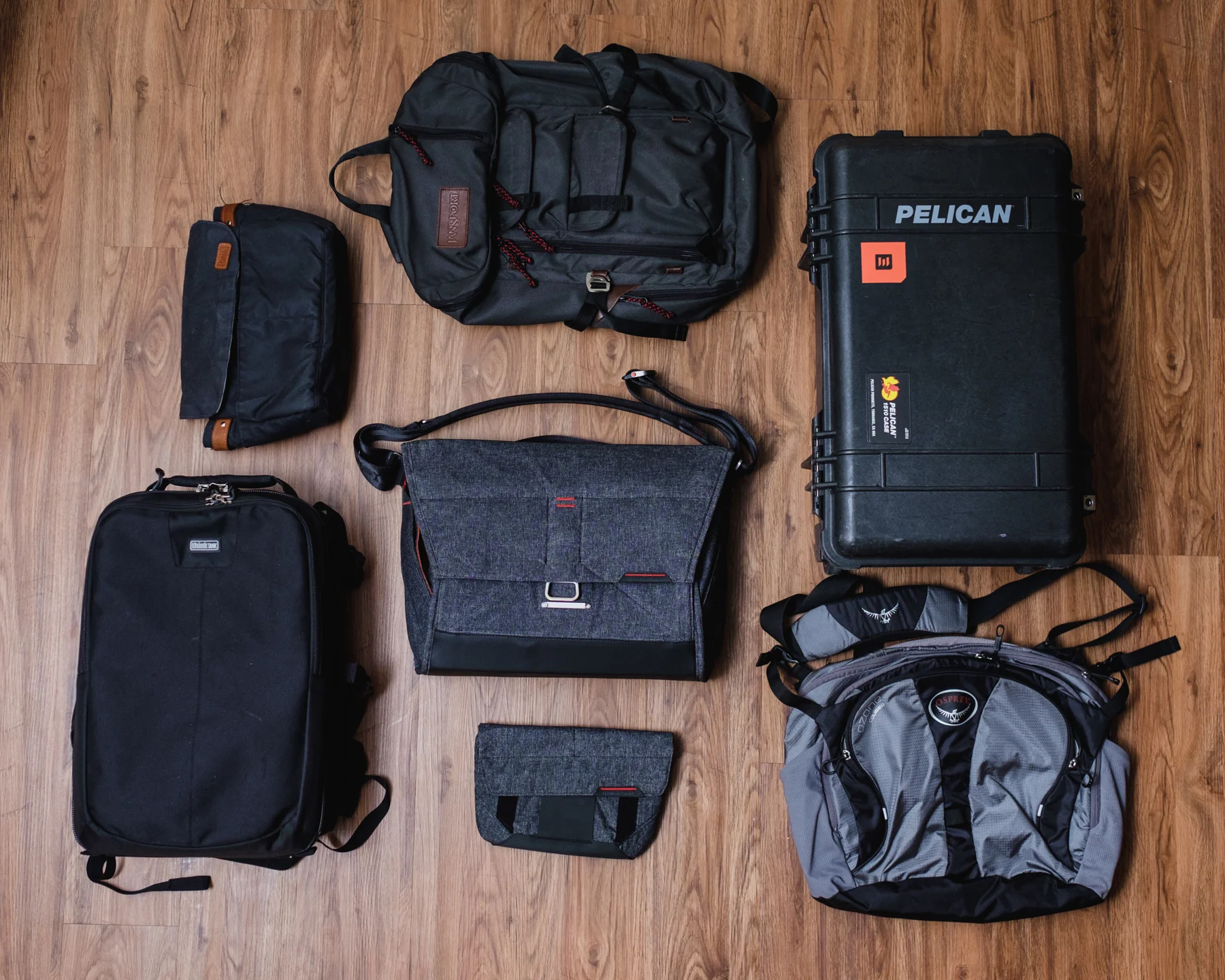 These are just a handful of the bags that I own and have used to carry my photography gear. My other bags were not included in this photo because there is not enough room to fit them all into one frame.