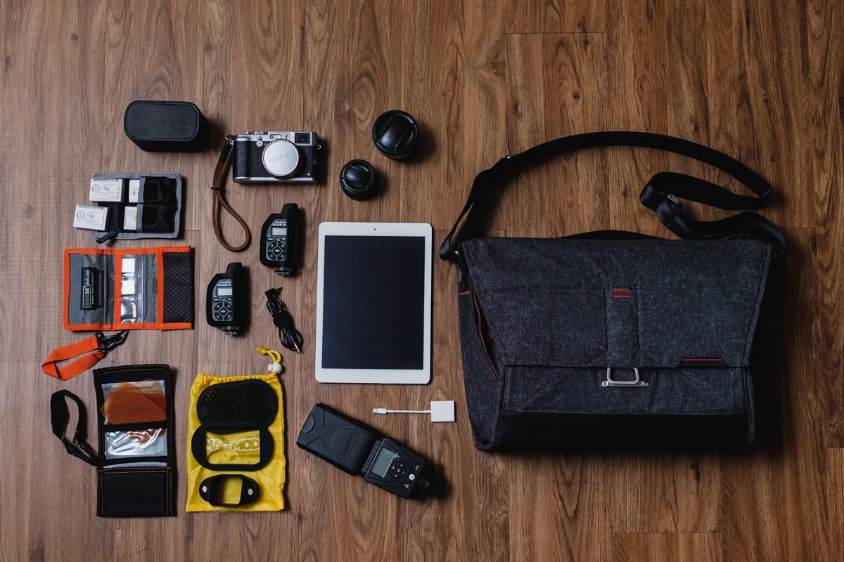 Ultimate setup "I wish I can shoot with only this bag" - My wishful thoughts of one day, going to a job only with this kit. UE Bluetooth Speaker, Think Tank Photo Battery Holder, 4x Fujifilm NP-95 Batteries, Think Tank Photo SD Pixel Pocket Rocket , SD Cards, Fujifilm X100s Camera , Fujifilm WCL-X100 & TCL-X100 Conversion Lense s, Apple iPad Air, Apple Lighting to SD Card Adapter, 2x PocketWizard Plus III Transceiver, Sync cord, MagMod Gel Kit, MagMod Basic Kit (Grid, Gel Slot, & MagGrip), Lumopro LP-180 Flash, and Apple iPad Air, and Apple Lighting to USB Cable