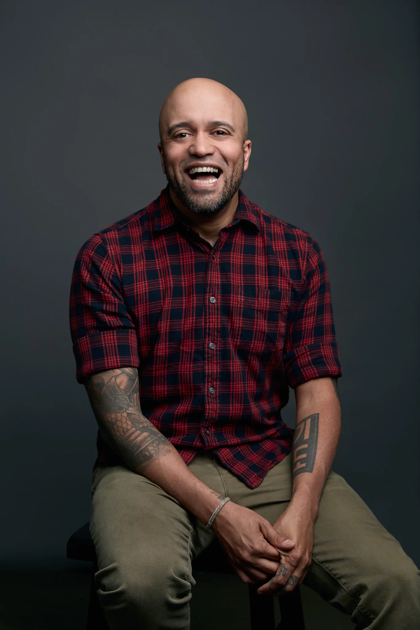 06-Studio_2-carlos_whittaker-speaker-press-kit-portrait-on-seamless.jpg