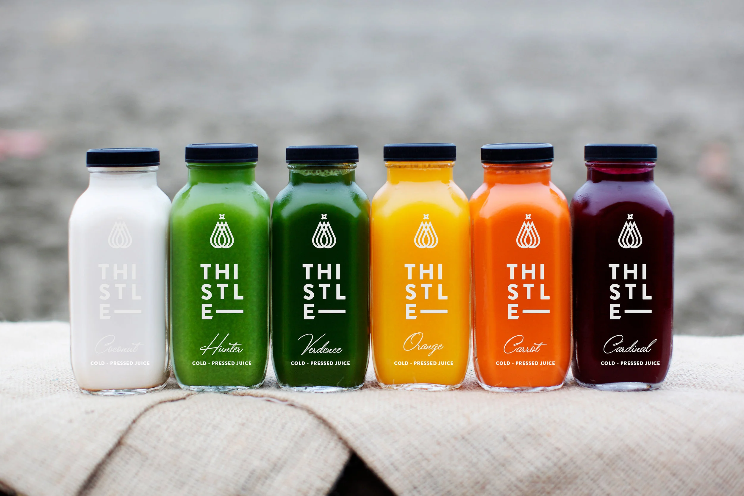 Thistle_SmBottles_Row2_72dpi.jpg
