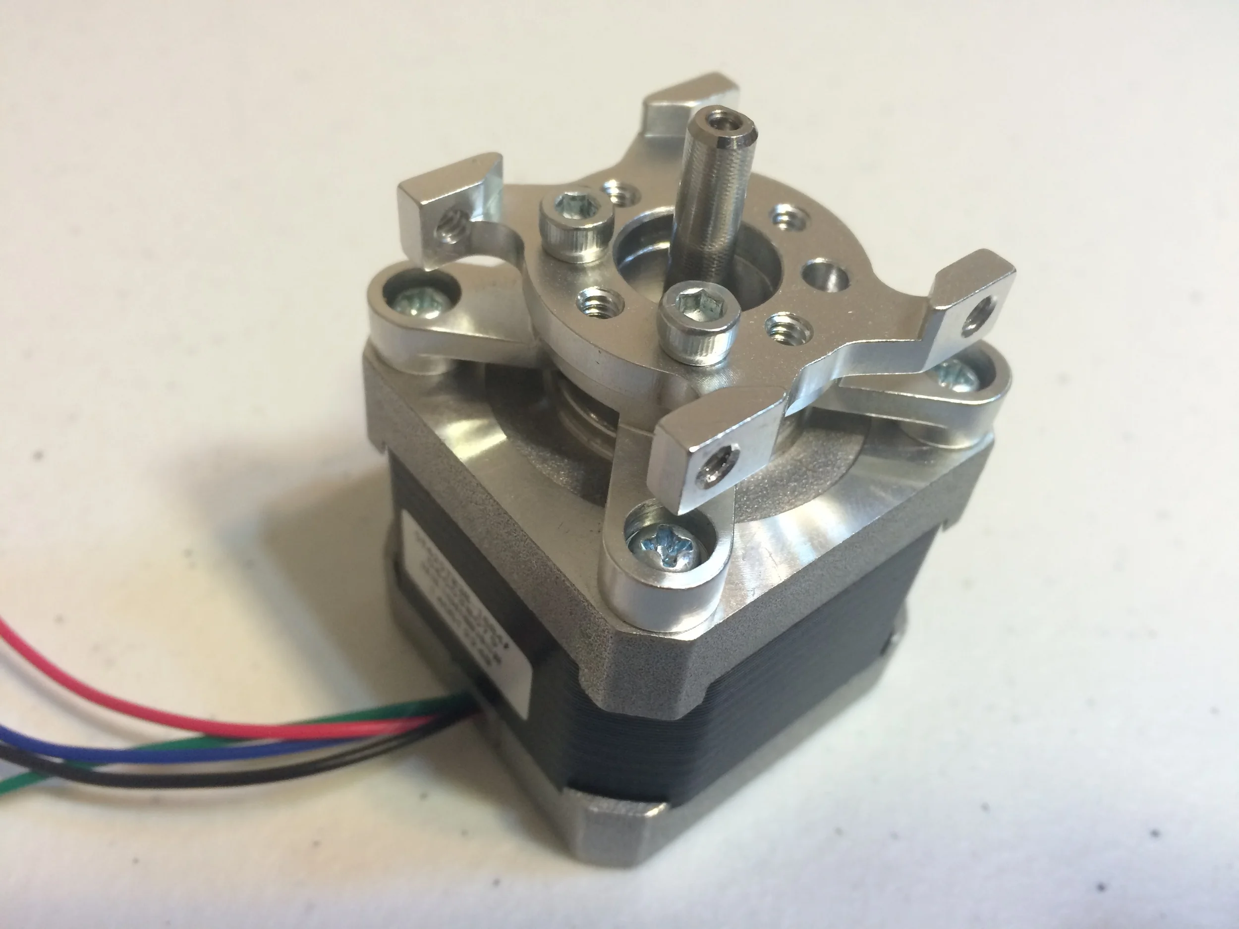 Stepper motor with WITH side tapped pattern MOUNT. NOTE THE ORIENTATION OF THE pattern MOUNT.