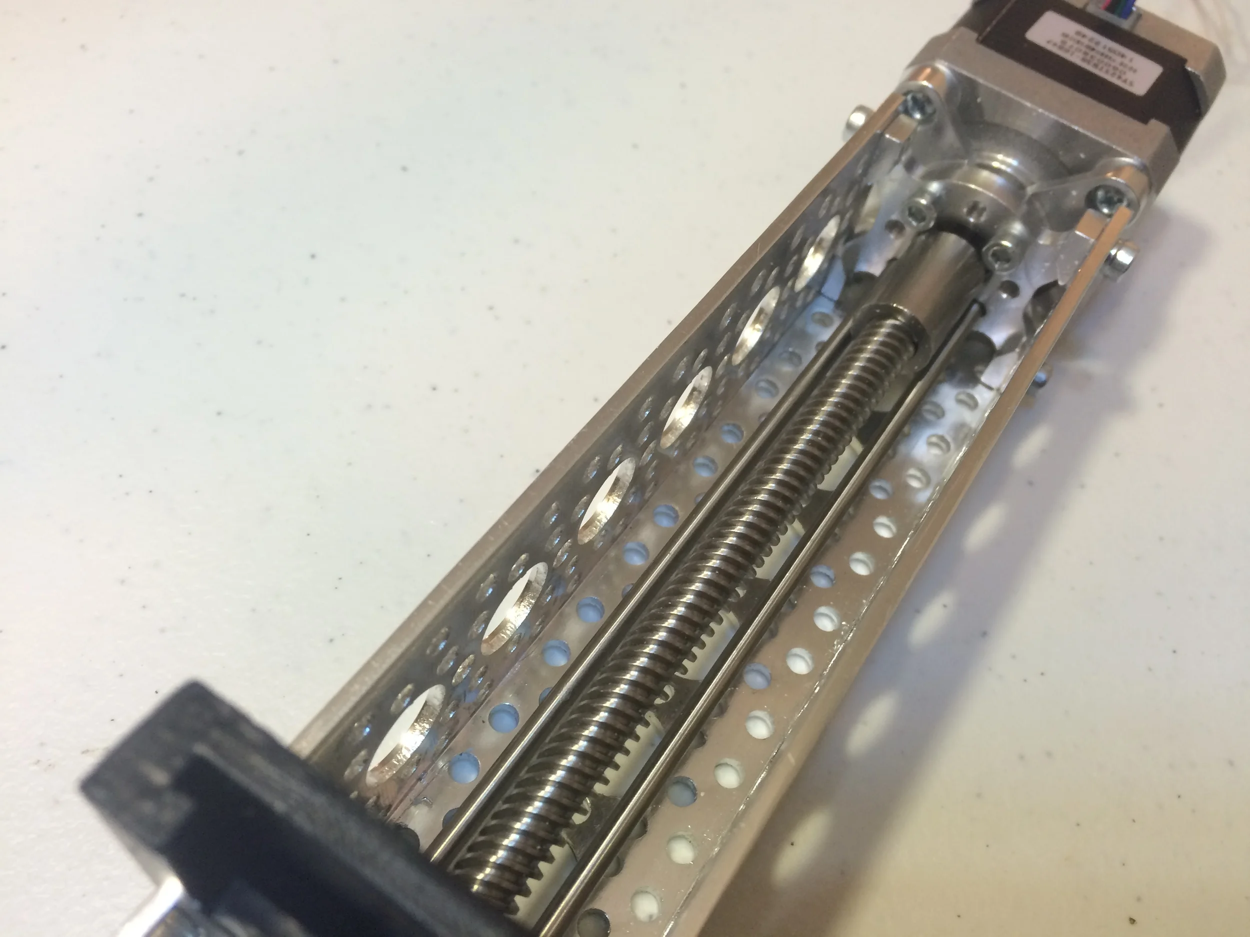 ACTOBOTICS CHANNEL WITH LINEAR STEPPER MOTOR, PLUNGER UNIT, SIDE TAPPED PATTERN MOUNT D, AND PRECISION SHAFTS. Back.
