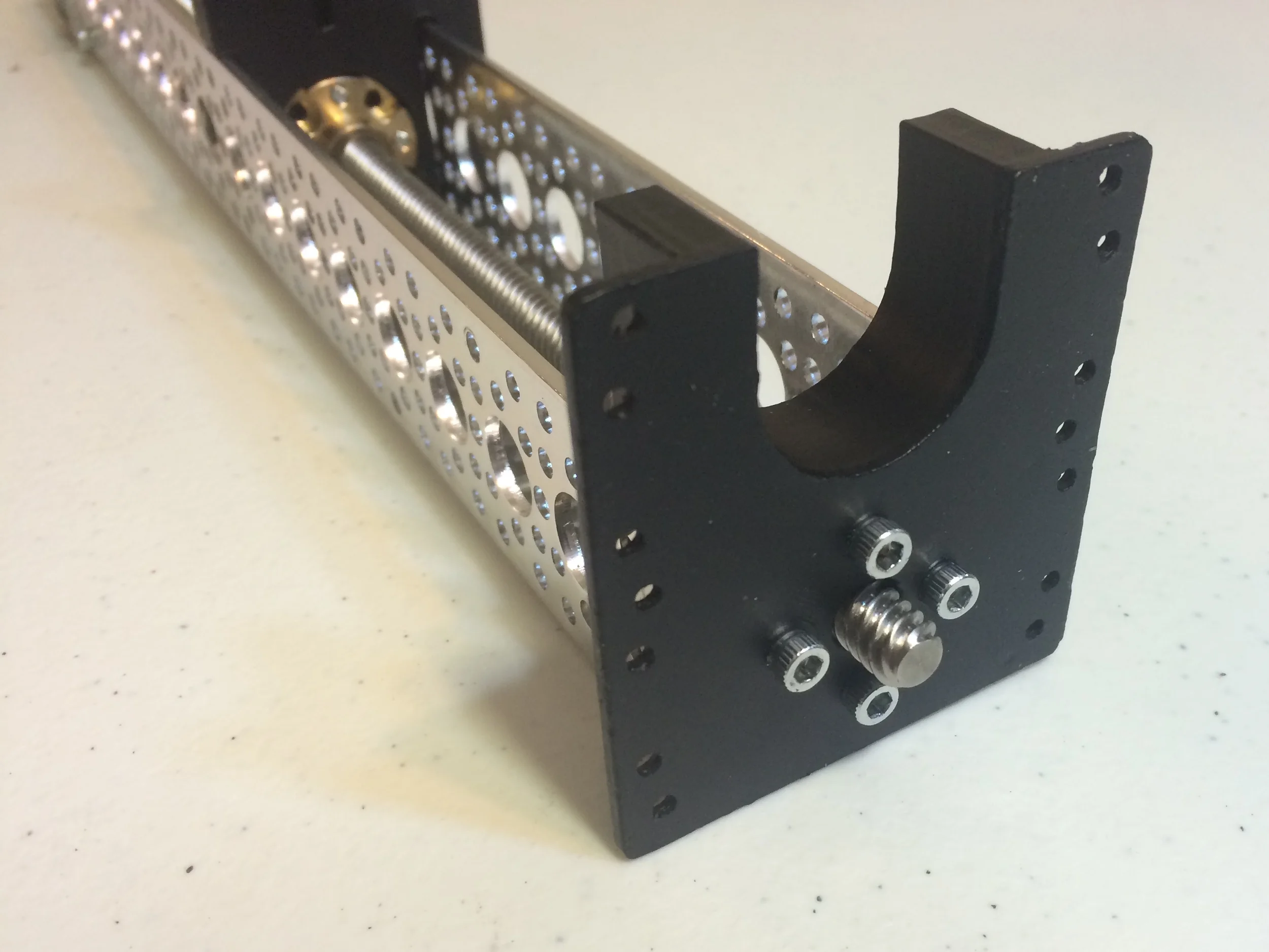 ACTOBOTICS CHANNEL WITH LINEAR STEPPER MOTOR, PLUNGER UNIT, SIDE TAPPED PATTERN MOUNT D, PRECISION SHAFTS, and front mount.