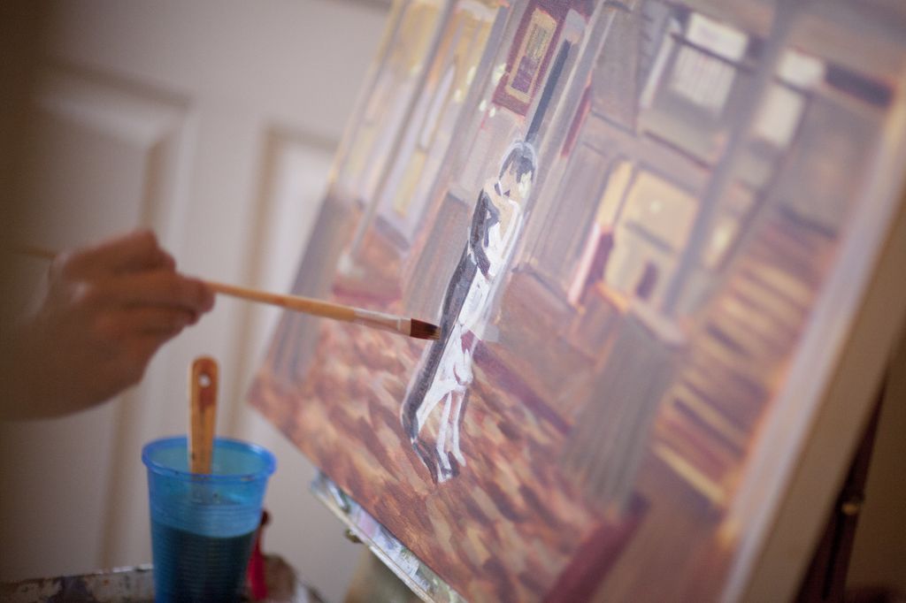 Wedding Artist Ben Keys of Wed on Canvas painting live at wedding reception.  //  The Graystone Inn, Wilmington, NC // Photo Courtesy of Blueberry Creative