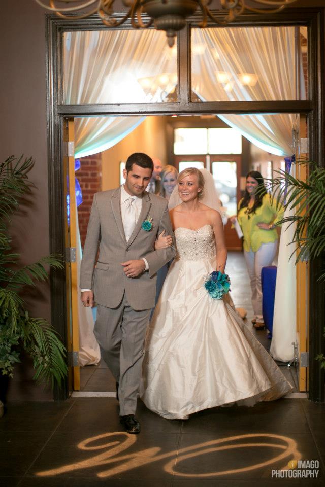 Bride and Groom at The Mill Event Hall of Chattanooga, Tennessee // Live Event Artist, Ben Keys of Wed on Canvas // Wedding Painting // Image Courtesy of Imago Photography // Gowns by Boutique Couture