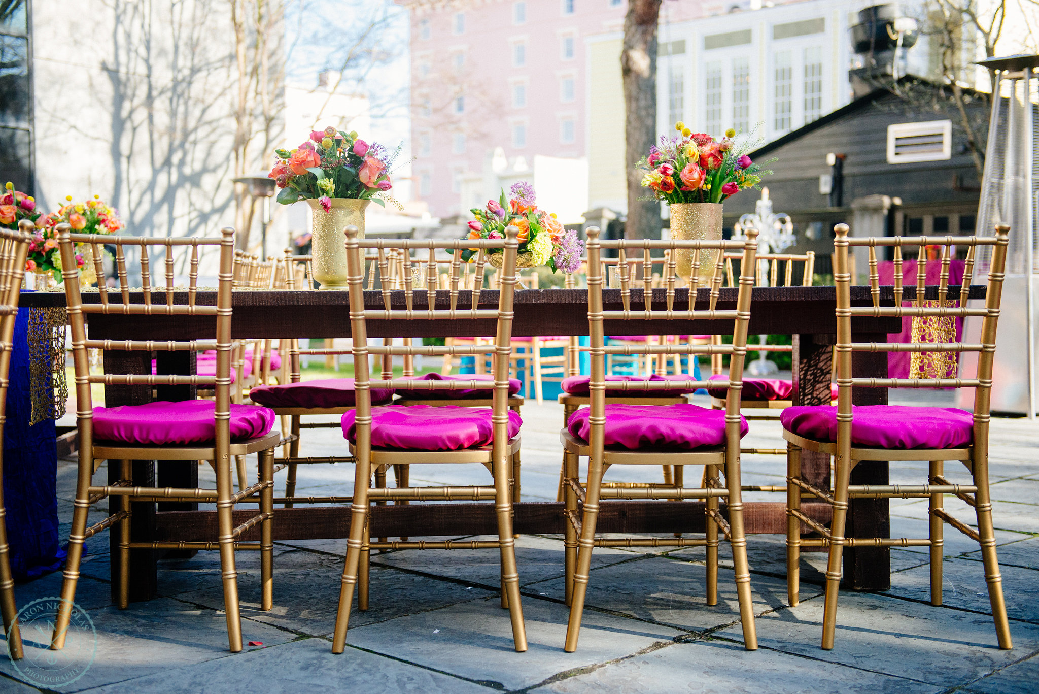 fuchsia-gold-chairs-farm-tables-glitter-gold-runner-gold-vase-pure-luxe-bride