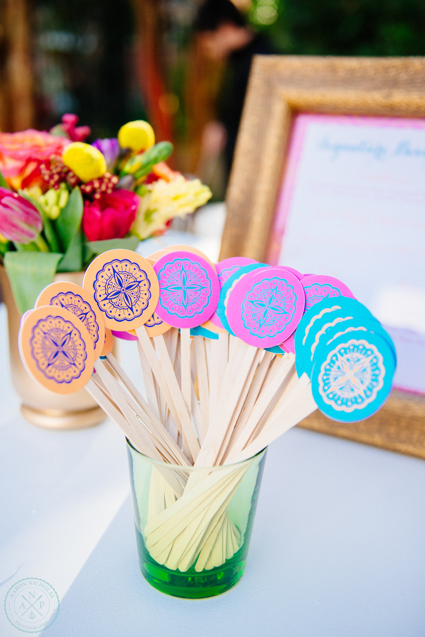 the-knot-market-mixer-drink-stirs-orange-fuchsia-teal-wedding-theme-moroccan