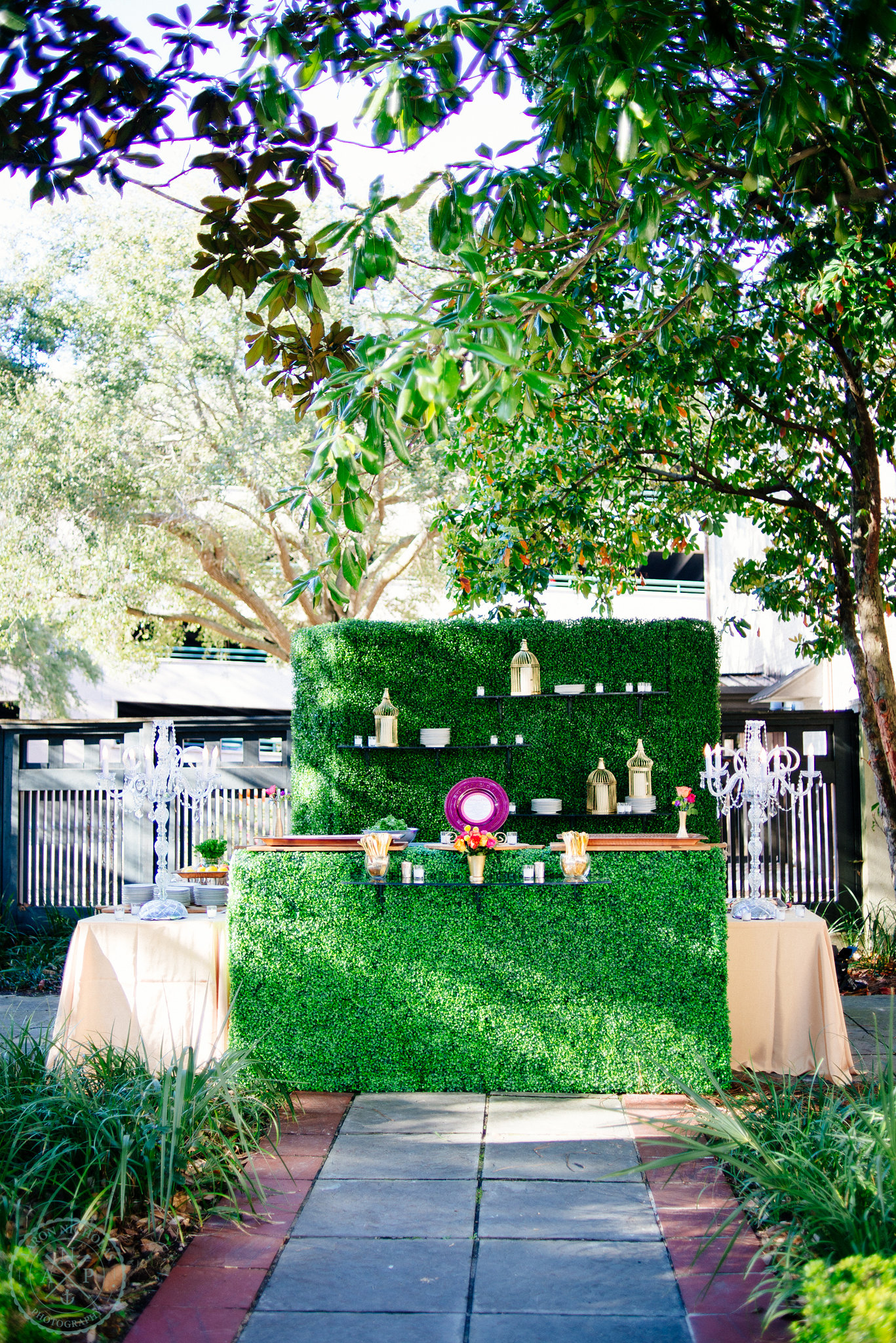 green-grass-bar-garden-reception-turquoise-teal-fuchsia-glass-chandelier