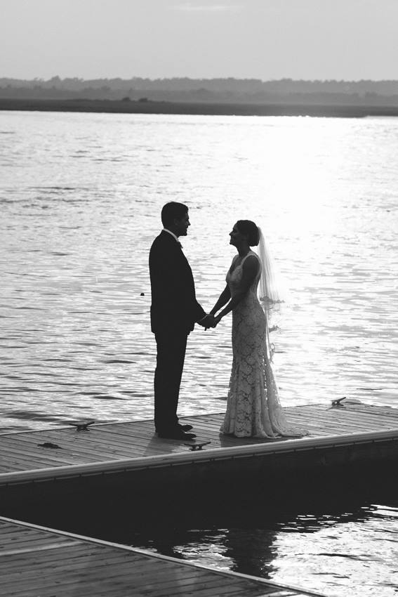 black-and-white-dock-bridal-portrait-beach-front-wedding-wed-on-canvas