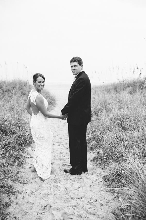 bride-and-groom-on-beach-path-wrightsville-beach