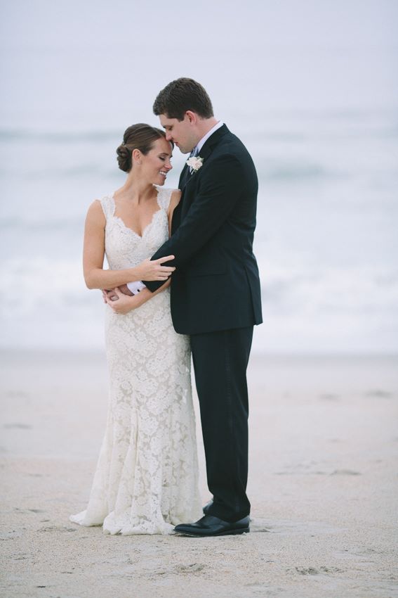 bride-and-groom-lace-gown-on-beach-wrightsville-wilmington-nc-wedding-painter