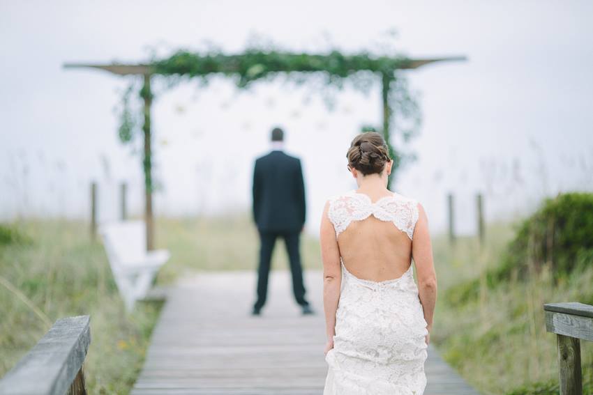 first-look-on-the-beach-wrightsville-wilmington-wedding-artist-lace-keyhole-back