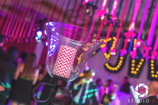 studio-m-photography-bat-mitzvah-artist-ben-keys-wed-on-canvas-fuchsia-chevron-marquee-lights-event-decor