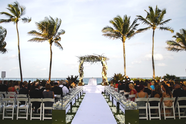 luxury-wedding-the-breakers-hotel-palm-beach-florida-candle-aisle-with-white-carpet-beach-wedding-artist-ben-keys-wed-on-canvas