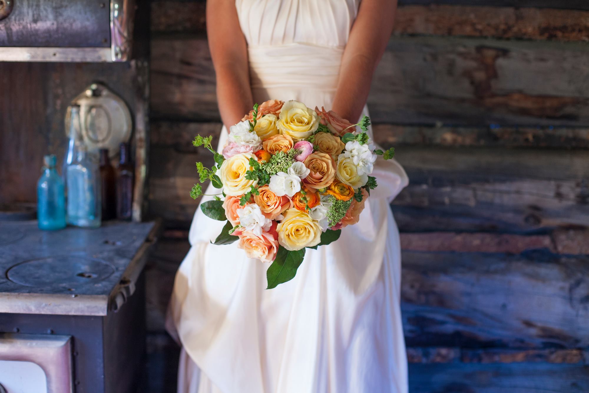 july-4th-wedding-breckenridge-dry-gulch-placer-wedding-painter-yellow-and-and-orange-rose-bouquet-rustic-wedding