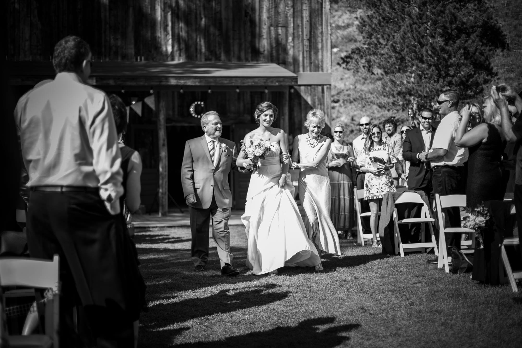 mother-and-father-walking-bride-down-the-aisle