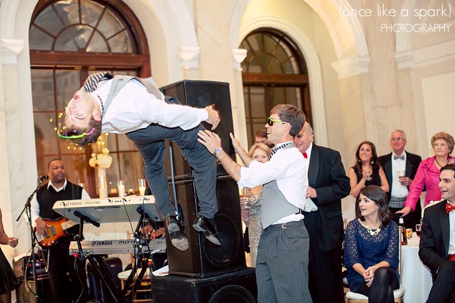 groom-flipping-in-the-air-at-wedding-atlanta-old-courhouse-on-the-square-epic-reception