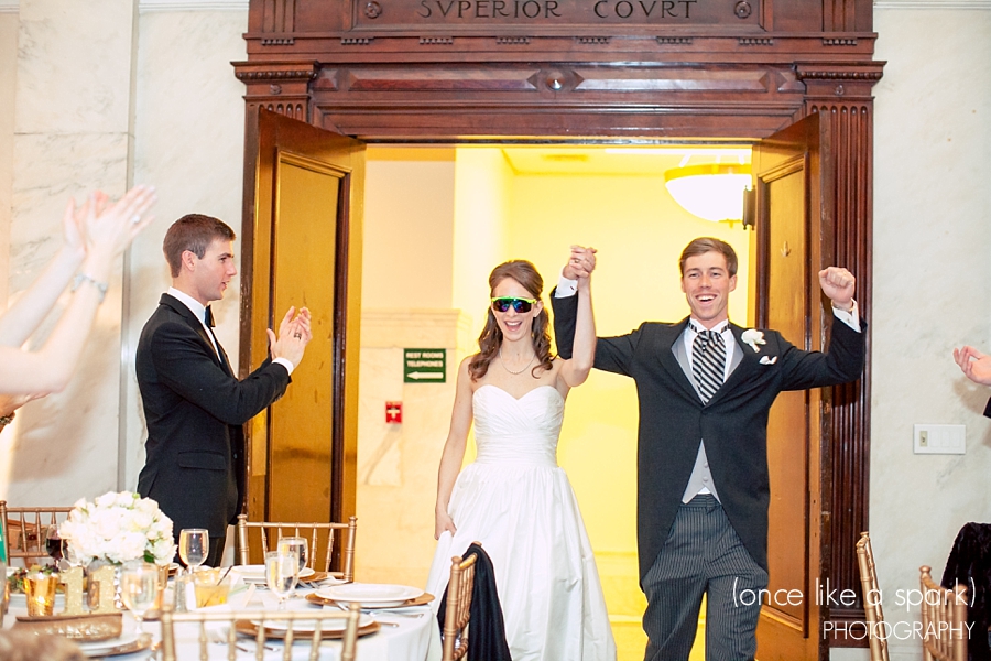 bride-and-groom-cool-entrance-atlanta-wedding-reception-old-courthouse-on-the-square-wed-on-canvas